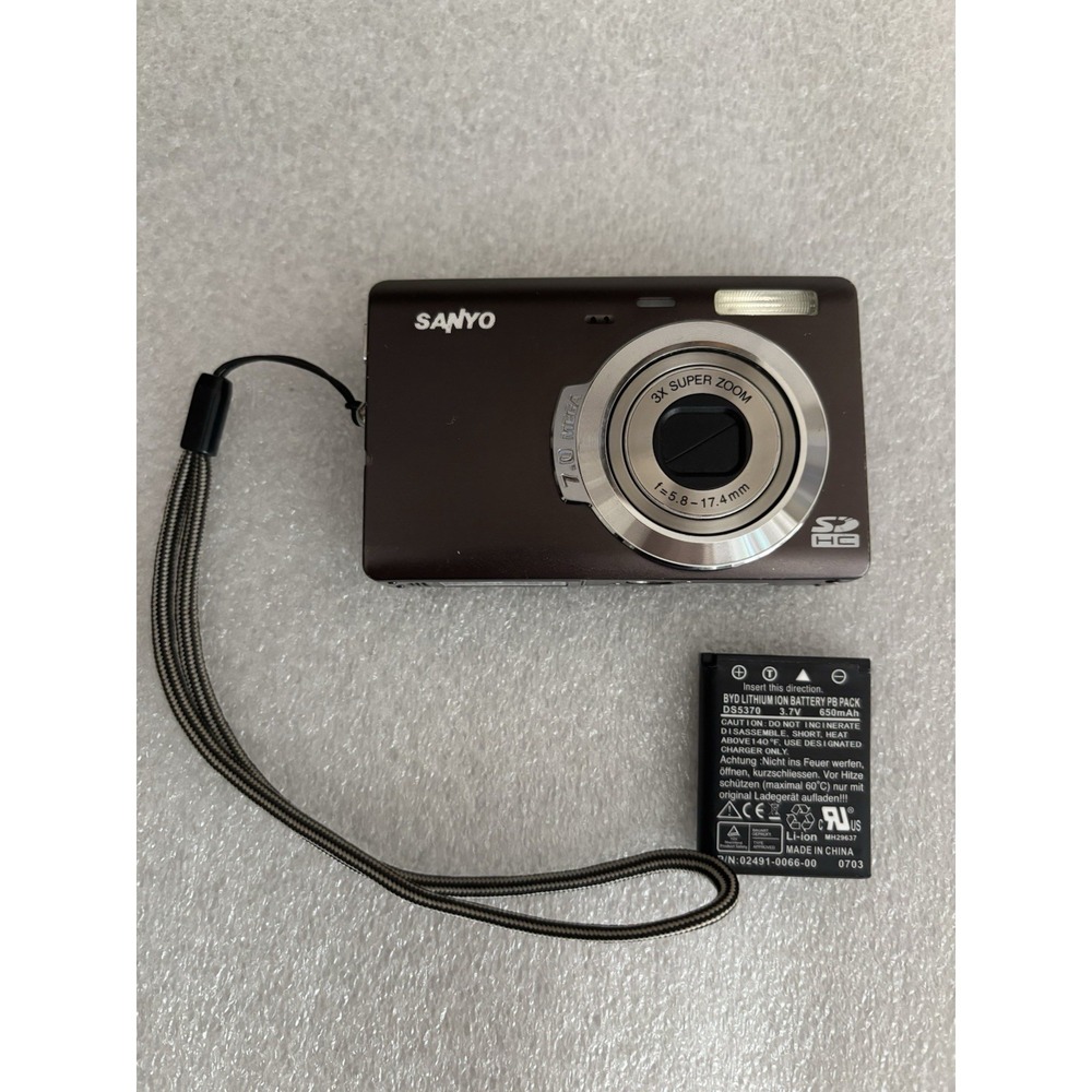 Sanyo VPC T700 7.0MP Digital Camera - Brown Tested With Battery. No Charger
